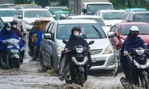 Không khí lạnh tràn xuống, miền Bắc tiếp tục mưa to